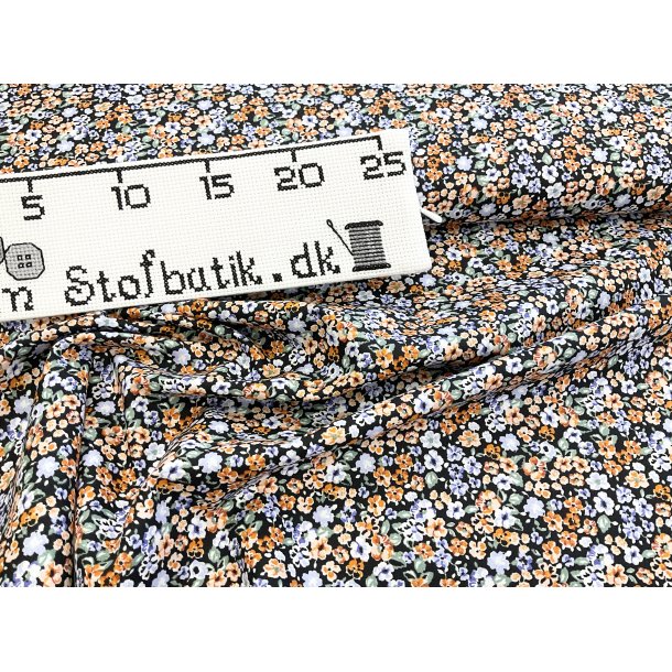 Fast 100 % bomuld poplin ttvvet, sort bund med orange bitte sm blomster 75 kr pr m