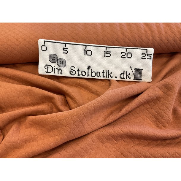Rust farvet bomulds quilt. 129 kr pr m