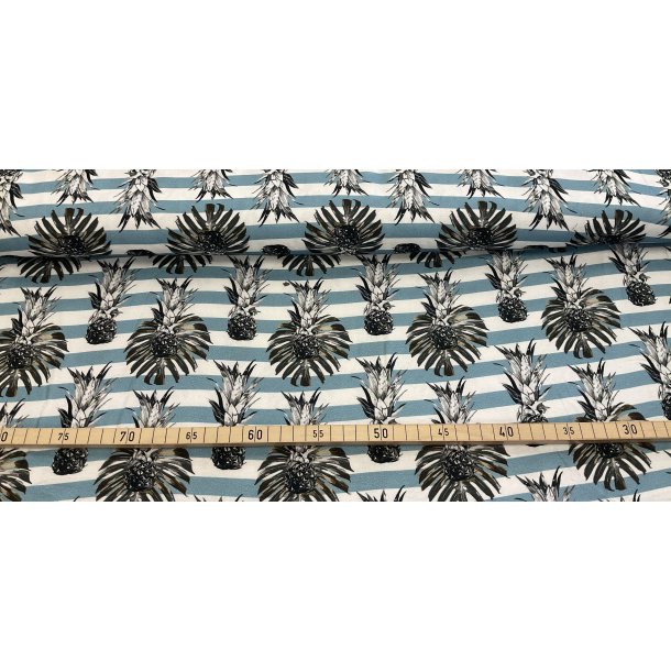 Fast viskose, med lidt struktur, bl hvid strib med friske ananas. 69 kr pr m