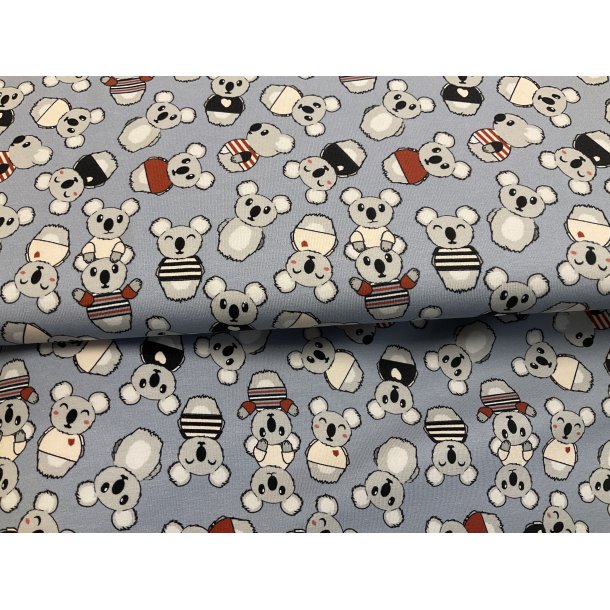 Bomulds jersey lysebl bund med koala 145 kr pr m