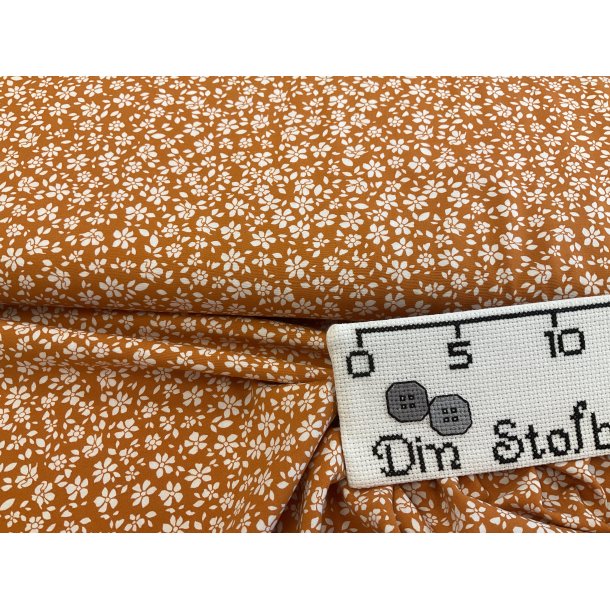 Fast viskose orange bundfarve med hvide sm blomster KUN 89 kr pr m