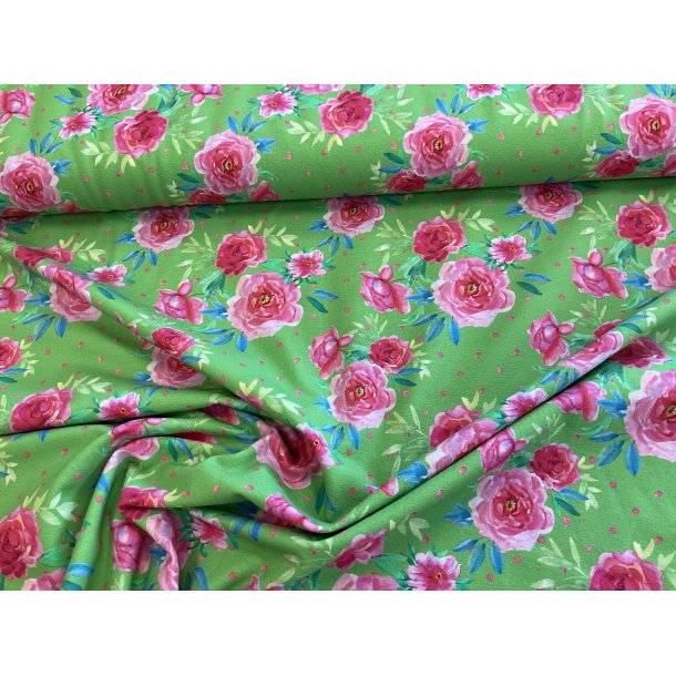 Bomulds jersey klar grn bund med pink blomster 145 kr pr m