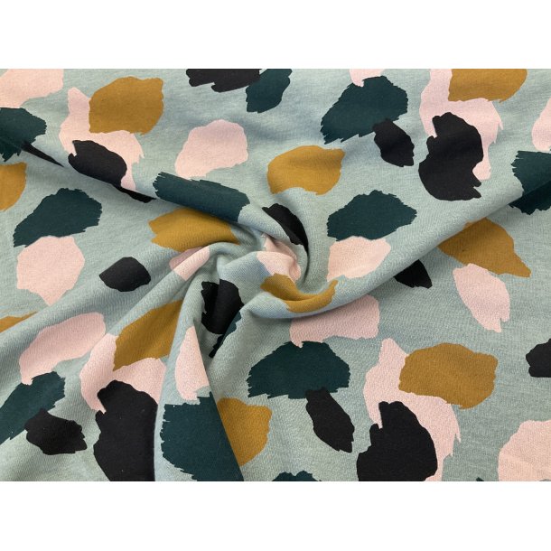 Isoli med bld bagside mint bund med store prikker. 129 kr pr m