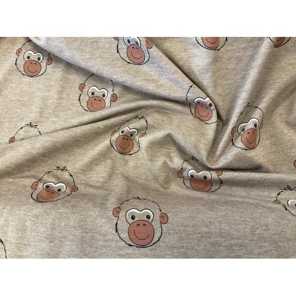 Bomulds jersey brun melleret bund med abe hoveder 129 kr pr m
