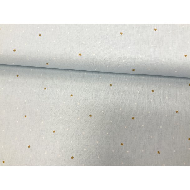 Fast 100 % bomuld poplin ttvvet, lysebl bundmed karry stjerner og hvide prikker. 69 kr pr m