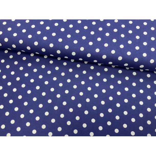 Fast 100 % bomuld poplin ttvvet, kobbolt bl bund med 1 cm prik. 69 kr pr m