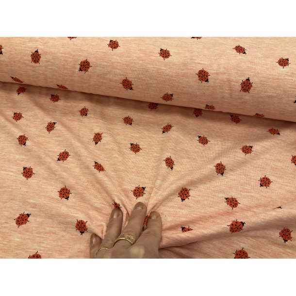 Bomulds jersey lyserd meleret bund med fine sm jordbr. 119 kr pr m