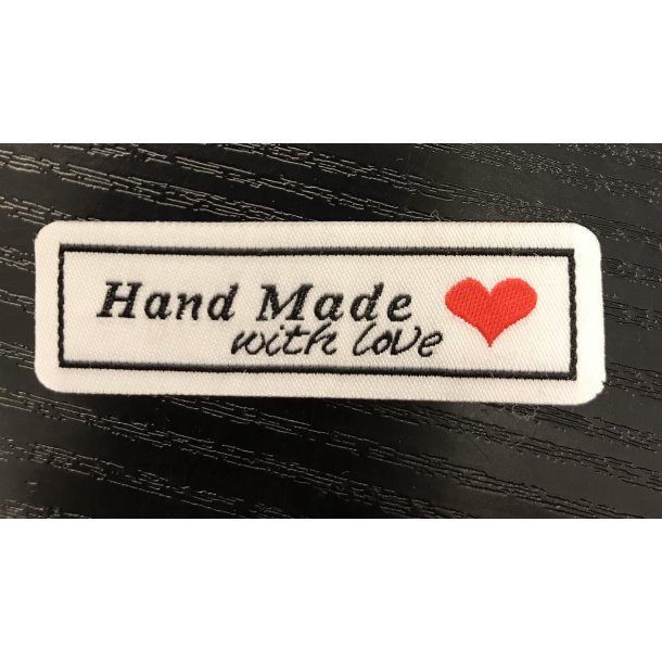 Strygemrke, Hand Made hvid med rd hjerte. 6 x 1,5 cm. 12 kr.