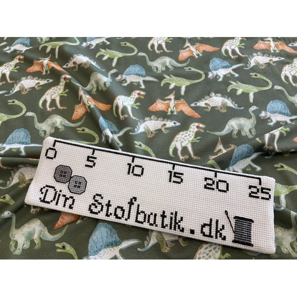 Bomulds jersey stvet grn bund med dinosaur 139 kr pr m