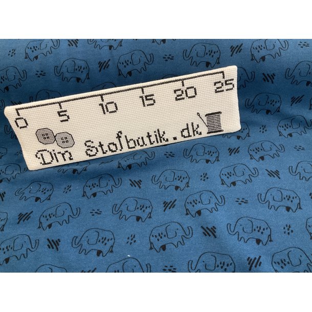 Isoli med bld bagside. 95% bomuld, 5% elastan. Bl bund med elefanter. 139 kr pr m